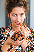 Woman eating pitted dates