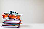 Administrative files and stethoscope