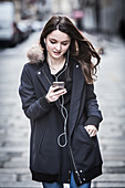 Teenage girl using a cell phone