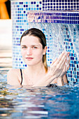 Woman in spa pool