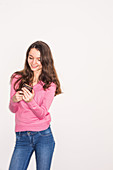 Teenage girl using a smartphone