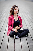 Woman practicing respiratory exercises