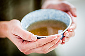 Woman drinking hot beverage