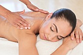 Woman having back massage