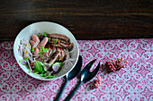 Beef salad with pink pepper