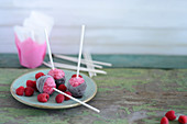 Raspberry ice pops and fresh raspberries