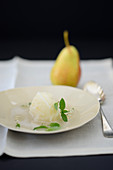 A scoop of pear sorbet with Thai basil