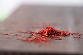 Saffron threads on a wooden table