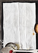 A linen cloth and ingredients for dumplings