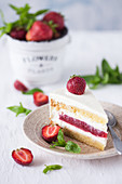 Slice of a vanilla and strawberry cake