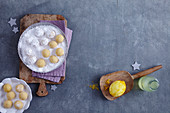 A baking arrangement featuring Limoncello balls (Italian Christmas cakes)