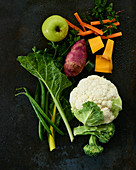 An arrangement of vegetables and fruit (ingredients for dog food)