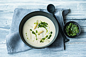Creamy white asparagus soup with wild garlic pesto
