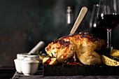 Roast chicken with potatoes and cranberry sauce