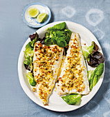 Hake with almond and lemon crust and olives