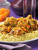 Tagine cooked chicken and apricots with couscous