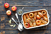 White veal sausages with apple and marjoram braised in a beer and mustard gravy