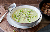 Vegan potato and leek soup with croutons