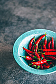Red chillies in a blue bowl