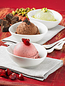 Cherry ice cream, dark chocolate ice cream, and pistachio ice cream