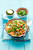 Thai curry with shrimps and rice tagliatelle