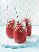 Pomegranate smoothies in glass jars