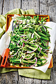 Green vegetable salad with basil dressing