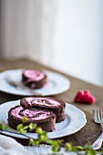 Chocolate sponge rolls with raspberry cream