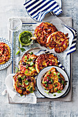 Mini bruschetta pizzas and mini pizzas with chorizo