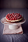 Chocolate cake with raspberries and cream
