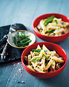 Penne in a creamy mushrooms sauce with crispy sage leaves