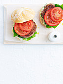 Quick lamb burger with tomato and caper herb mayonnaise
