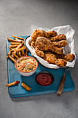 Crispy american style chicken with chips and coleslaw