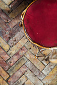 Herringbone-patterned brick paving