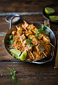 Curry salmon kebabs on rice