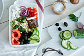 Greek salad with quinoa and a honey and olive oil dressing