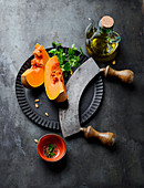 Pumpkin wedges with olive oil and spices