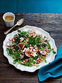 Winter salad with figs, radishes and red onions
