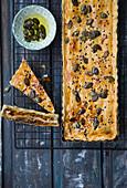 Puff pastry pie with carrots and pumpkin seeds