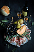 Plate of Ham with Pears, Grapes and Melon