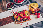 Wholemeal toast with a chocolate spread and fruit