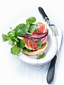 Marinated duck breast with a fig and coriander salad