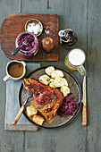 Roast pork with a beer sauce and red cabbage
