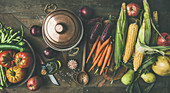 Autumn ingredients for Thanksgiving: green beans, corn cobs, carrot, tomatoes, eggplant, pears, apples