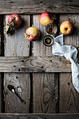 Apples and coffee on rustic wooden table