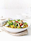 Pasta salad with lentils, pesto and beans