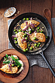 Chicken Agrodolce (sweet and sour chicken) with olives and pine nuts