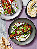 Harrisa Baked Aubergines served with hummus and nan bread