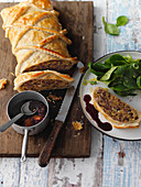 Game strudel with chanterelle mushrooms and a shallot and red wine sauce