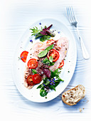 Bream fillets with tomatoes and herbs (Italy)